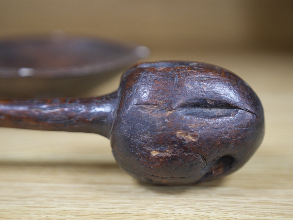 A Fijian throwing club, ula, and Fijian Kava oil bowl with mother of pearl inlay, largest 38cm in length. Condition - good